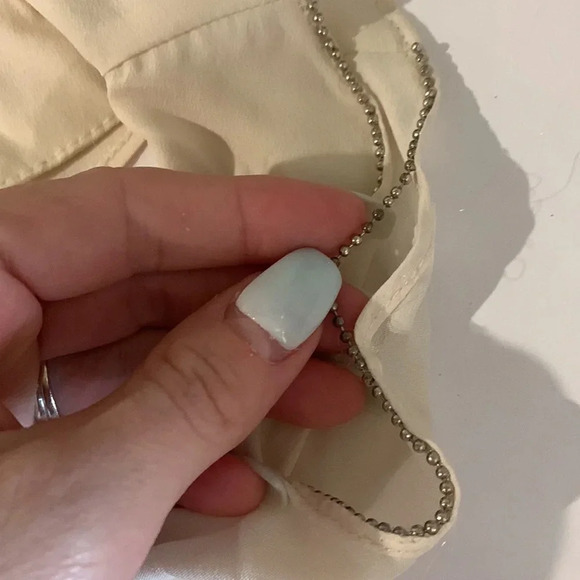 BODY CENTRAL cream colored ruffle top with beaded neck details - Picture 11 of 11